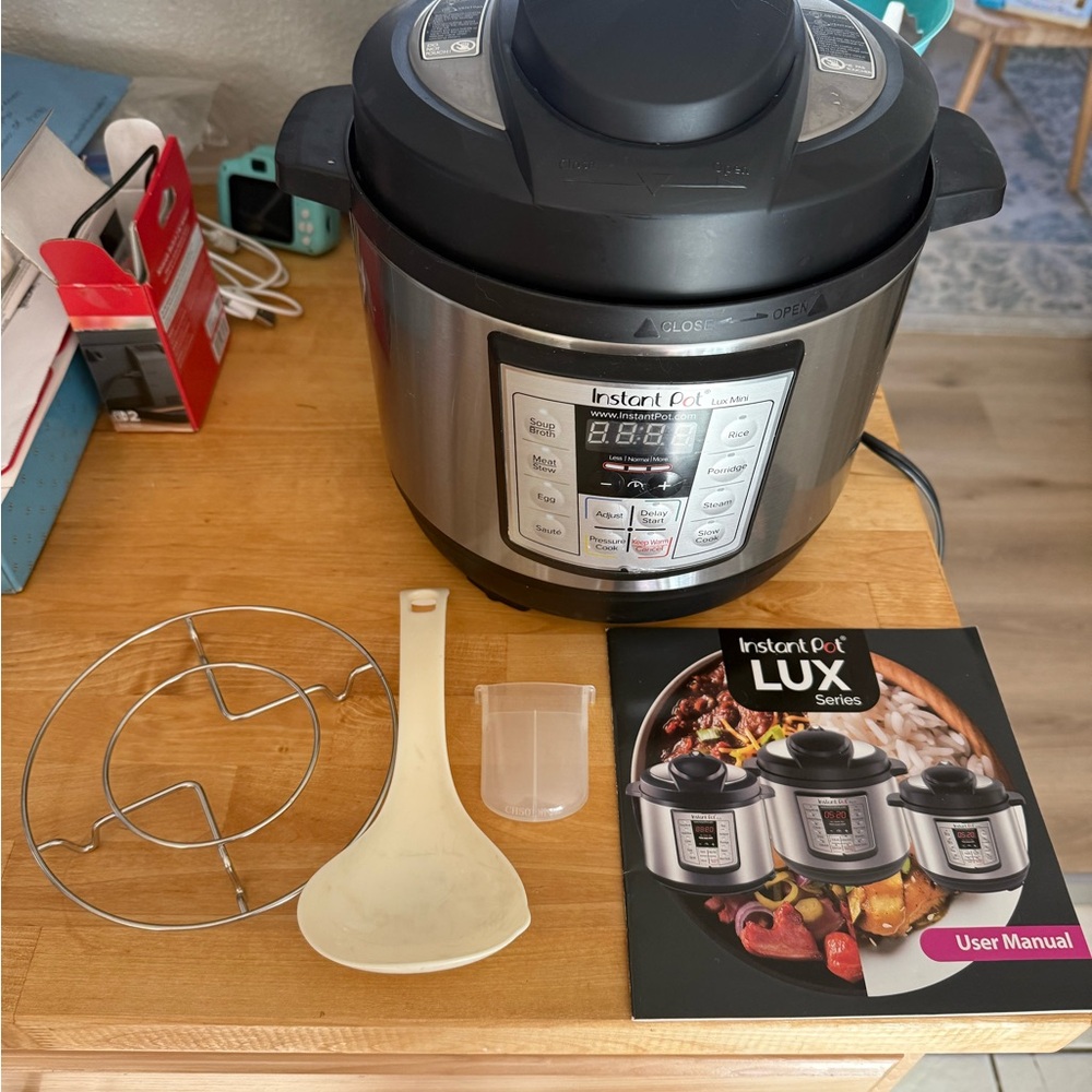 Instant Pot LUX Series Multi-Use Pressure Cooker - Black and Silver